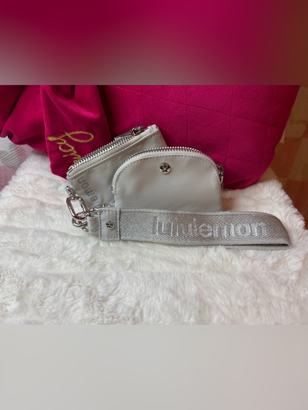 NWOT Lululemon athletica Silver dual pouch wristlet.